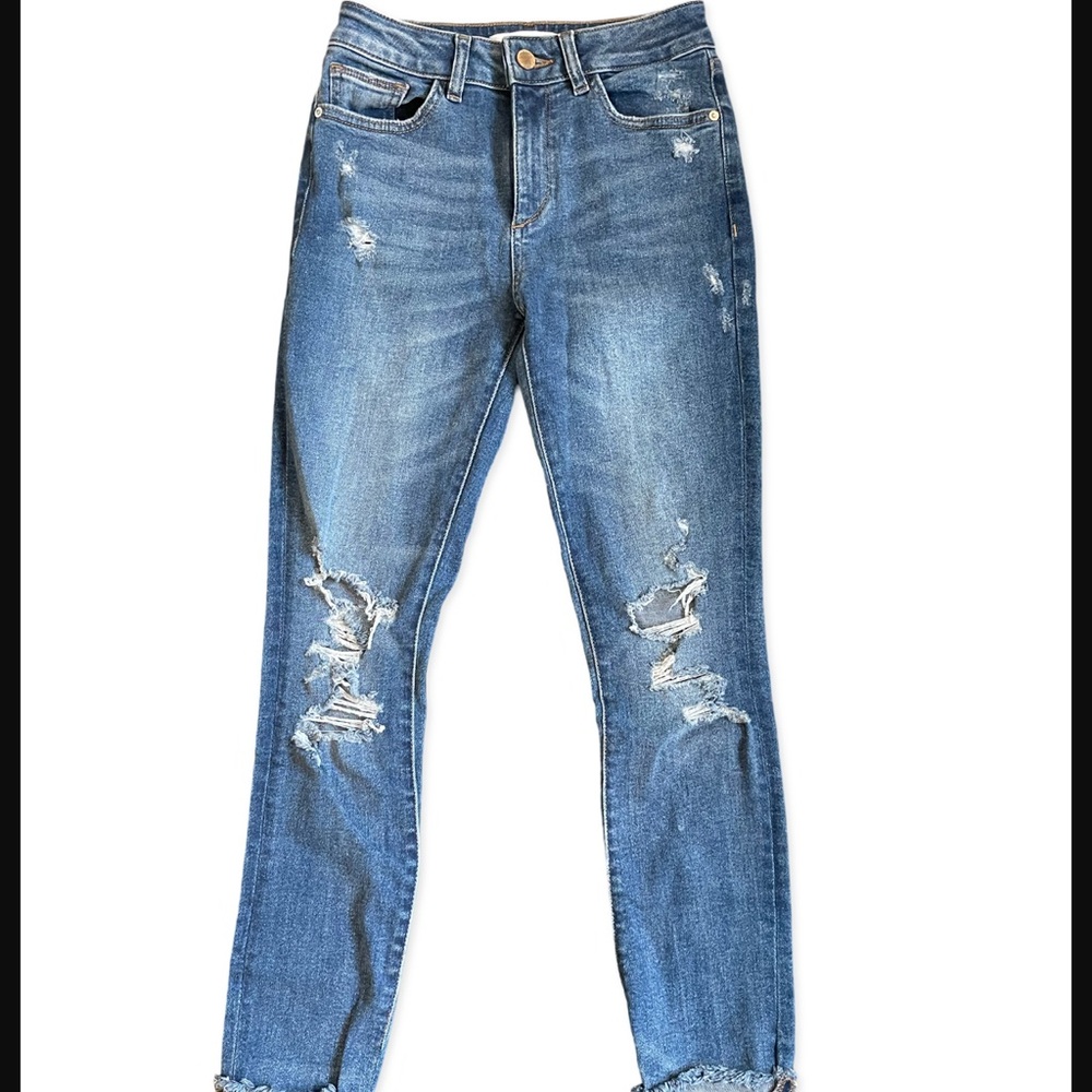Distressed Blue Jeans